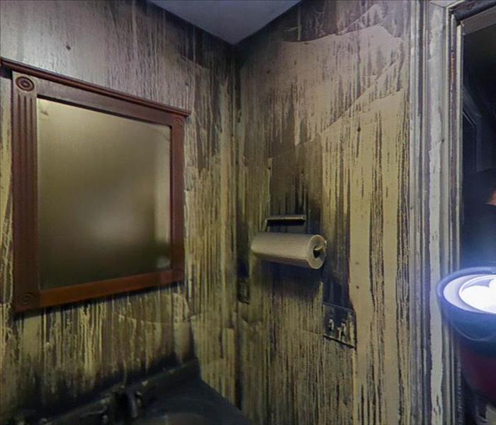 Soot covered bathroom. 