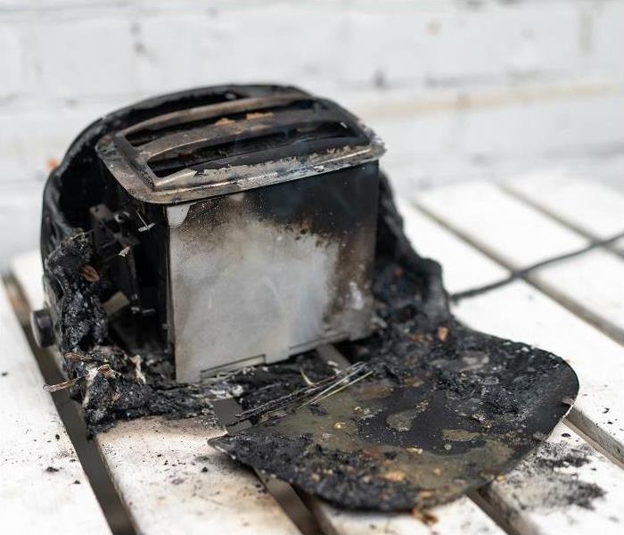 burned and charred toaster